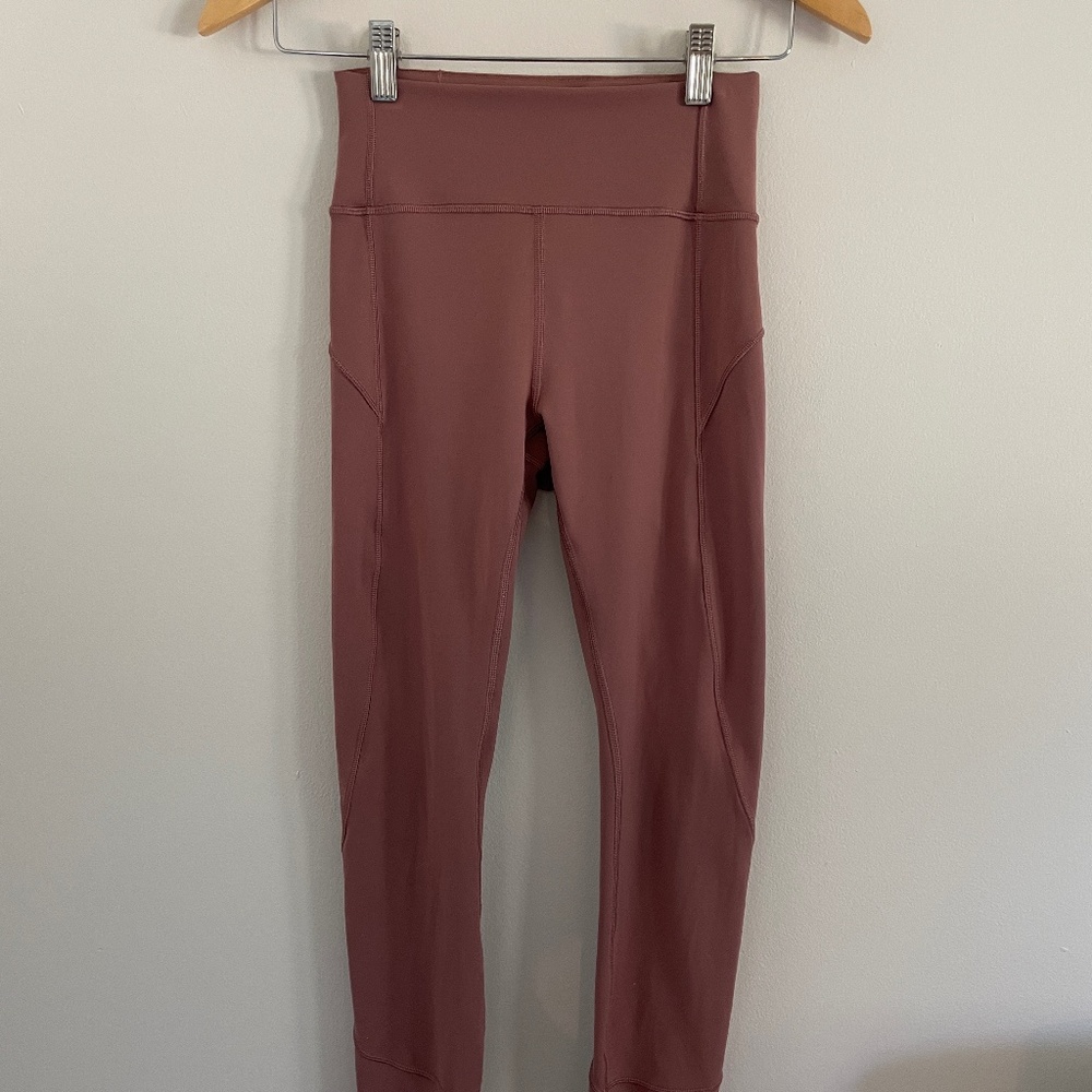Lululemon In Movement Tight 25" *Everlux in Red Dust Size 4
